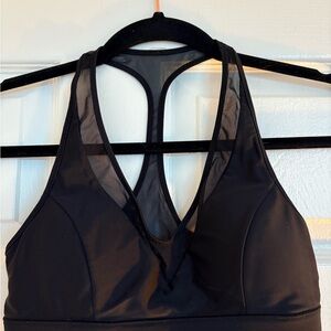 Black Sports Bra with Racerback Design and V-Shaped Neckline